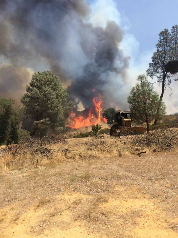 Clayton fire rages, parent firefighter called to duty