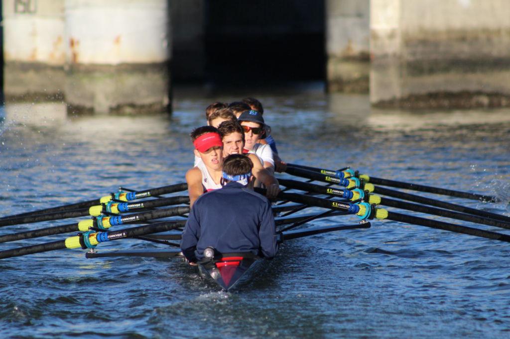 The boys varsity rowing team shows grit and determination during practice