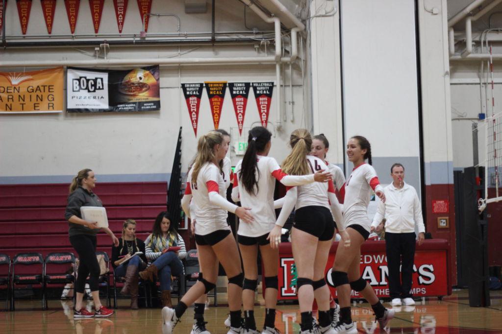 The team comes together after winning a point against Justin Siena on Tuesday, October 15