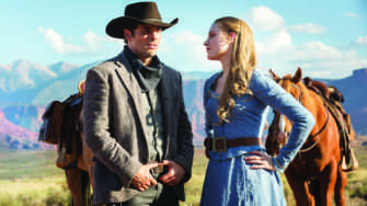 RIDING THROUGH THE park, hosts Teddy Flood (James Marsden) and Dolores Abernathy (Evan Rachel Wood) stop to question the nature of their journey. 
