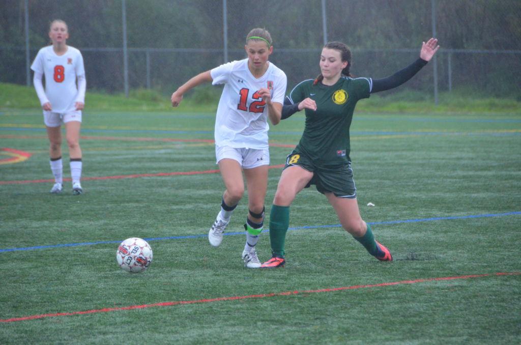 Freshman captain Delaney Anderson battles with San Marin for the ball