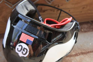 Many players had "GC" stickers on the back of their helmets.