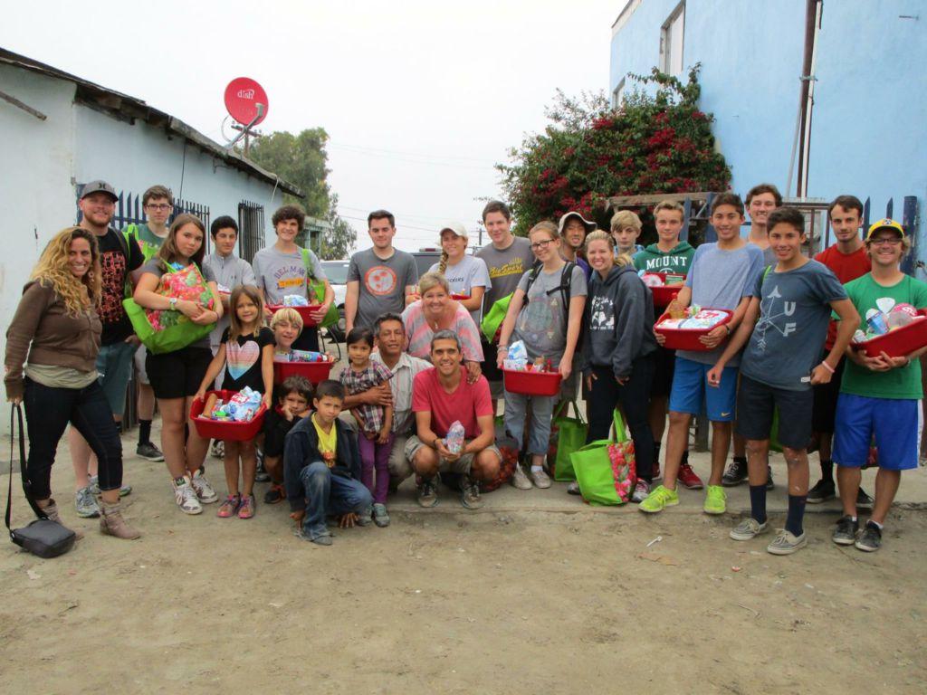 Standing with his mission group, junior Jake Hanssen spends time in Mexico using his Spanish skills.