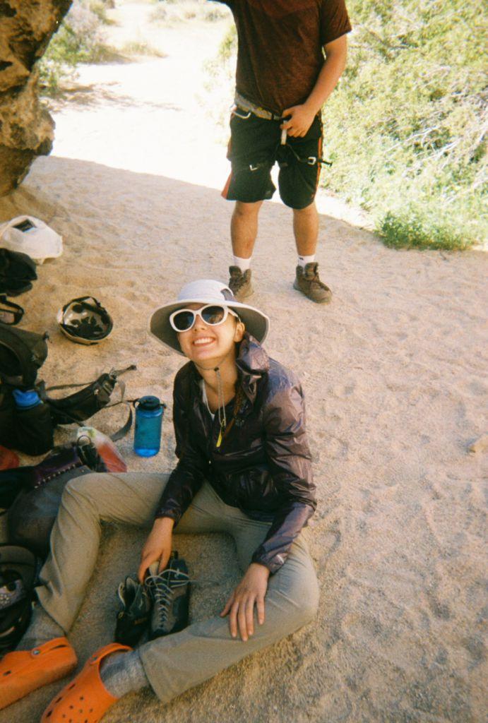 Taking a break from a long day of backpacking, Senior Anna Martin sits near Joshua Tree