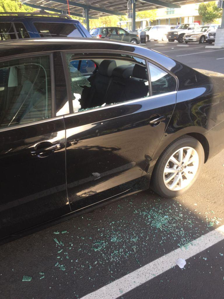 Juniors car window smashed open after bags and keys were taken from the car