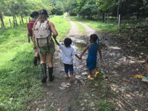 Slaugh walking with kids from Panama 