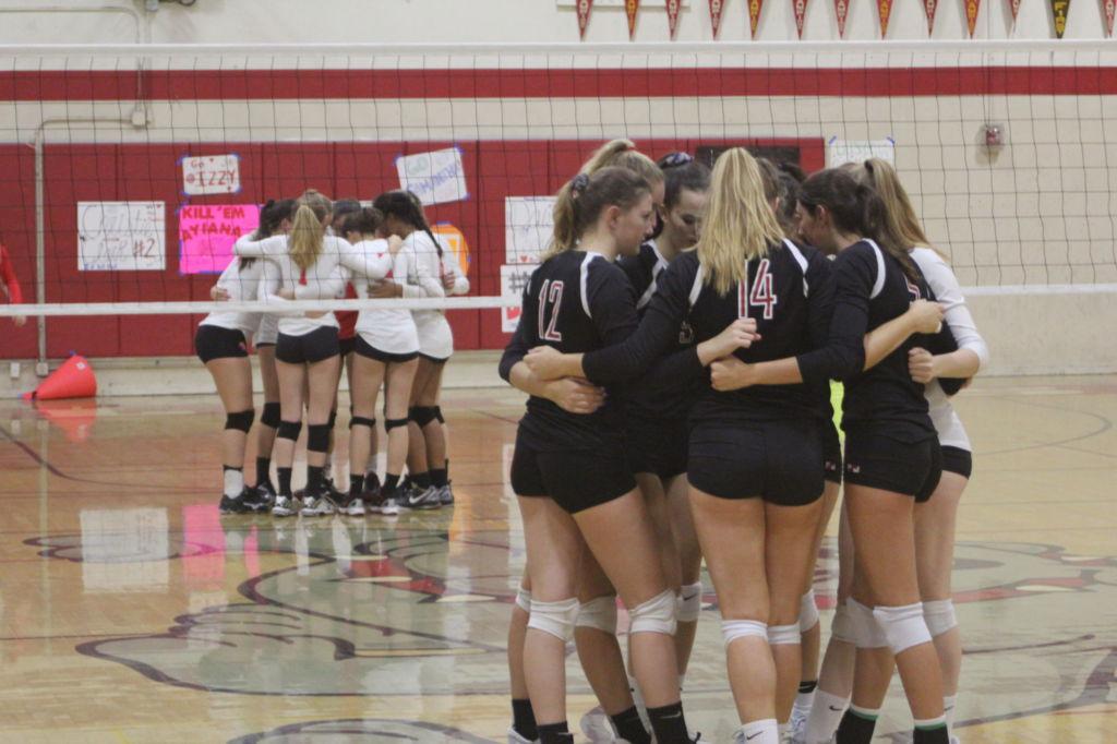 Varsity volleyball’s tenacious offensive digs up a win vs. Bulldogs