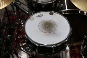 Camden's beat up drum from hours of practicing.