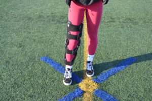 McGonigle wears a brace to protect her knee from any further injuries. 