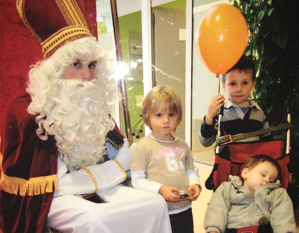 Junior Luis Schmidt Minestrelli at age 8 (holding the balloon) and his siblings meeting Saint. Nicholas in their hometown of Chaumont-Gistoux, Belgium.