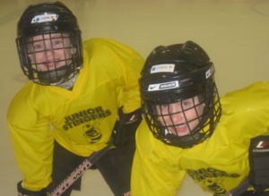 Playing at a rink in Canada, Lucas (left) and Jacob (right) have been involved with hockey since they were very young.