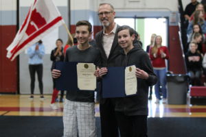 Honoring Bennett Somerville and Ethan Davis, Congressman Jared Huffman announces the success of their homework planning app at the Winter Rally on Feb. 1.