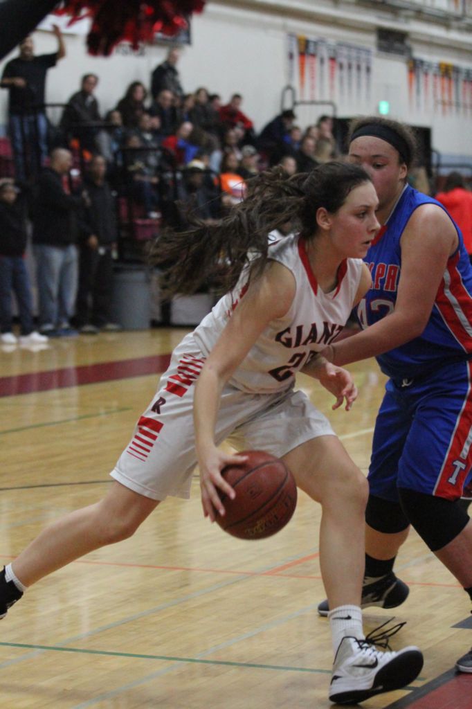 Dribbling past her opponent, Stachowski defensive skills attribute immensely to the varsity team.