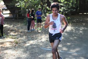 Redwood runner crosses the finish line