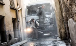 Ethan Hunt (Tom Cruise) and August Walker (Henry Cavill) abandon their destroyed truck to continue on foot.