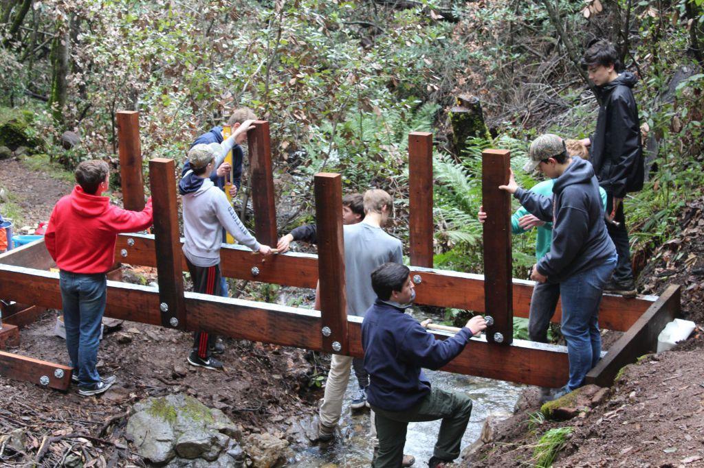 Courtesy of Carl Valdes. Carl Valdes and his friends start to work on the new and improved foot bridge on Mount Tamalpais.  
