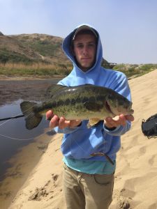 Displaying his catch of the day, Owen Henderson shares many of his fishing experiences on his YouTube account.