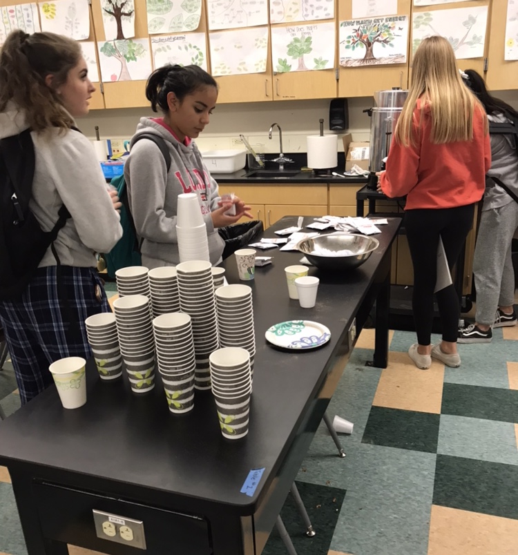 Students at Cocoa and Cram, having hot chocolate and visiting teachers before finals week begins. 