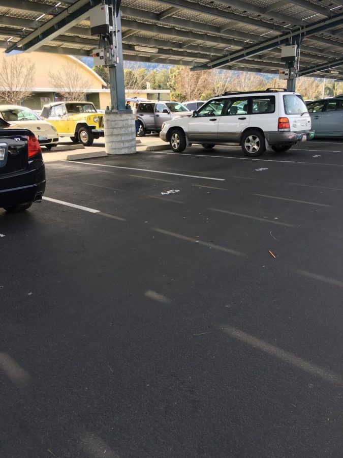 Parking spaces are left open on the first day assigned parking went into place
