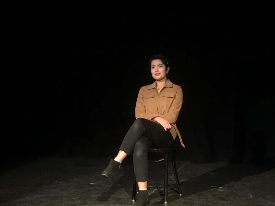 Performing her monologue, Champommier sits.