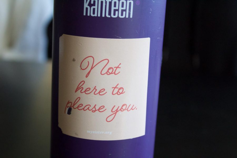 Expressing feminism can be shown through accessories or other items. Some student feminists wear pins on their backpacks or place stickers on water bottles.