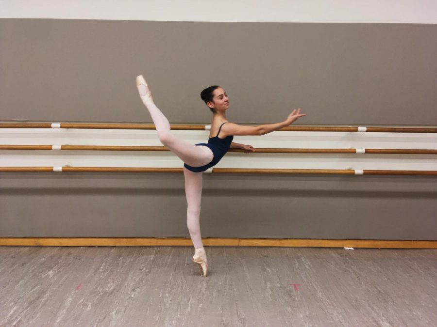 Gracefully refining her technique, Lubinski practices her back attitude at the barre at San Francisco Ballet school, where she takes classes. 