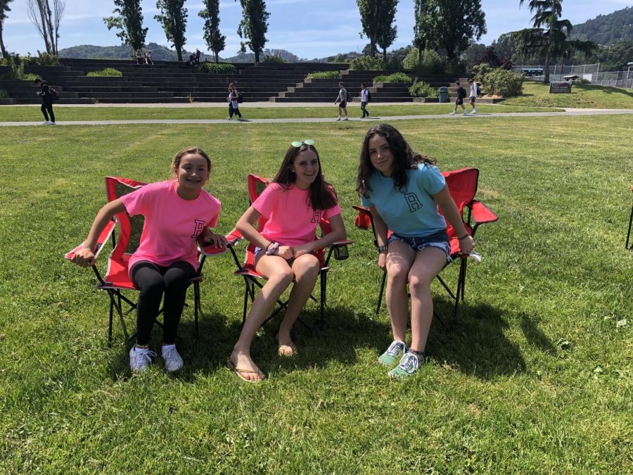 Sitting together in lawn chairs, Leadership students host Lawn Chair Friday at lunch with music, games and popsicles.