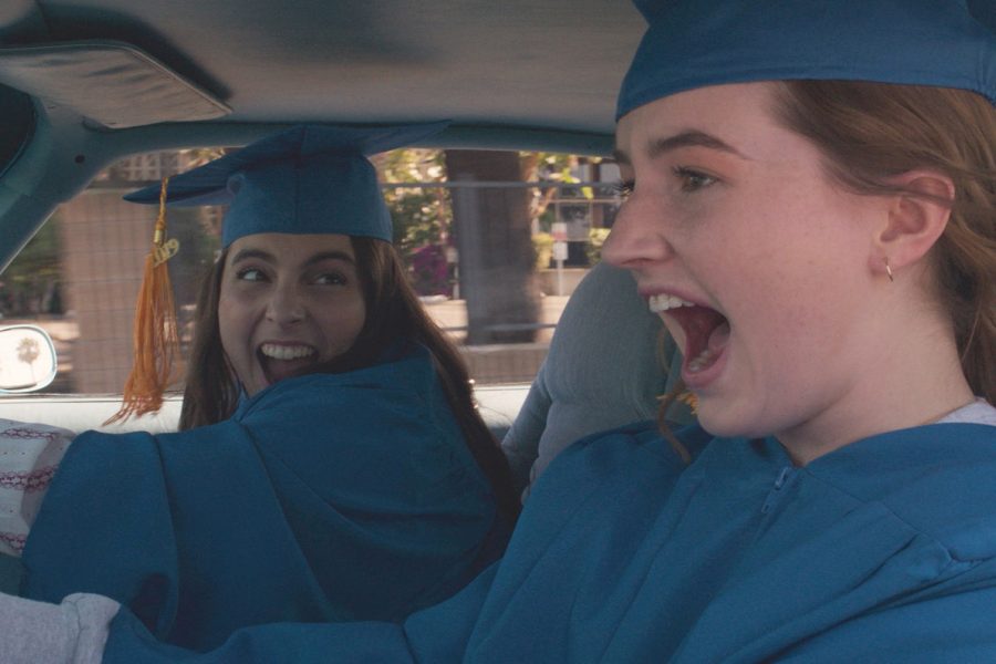 Zooming away, Molly (Beanie Feldstein) and her best friend Amy (Kaitlyn Dever) speed to their last day of graduation in the movie Booksmart directed by Olivia Wilde.