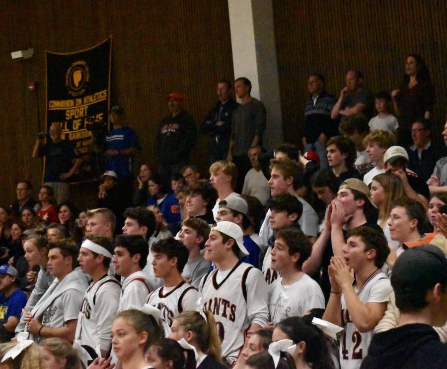 Despite the boys varsity basketball teams 48-26 loss to Branson, Redwood students continued to cheer loudly for their peers at the white out themed game. 