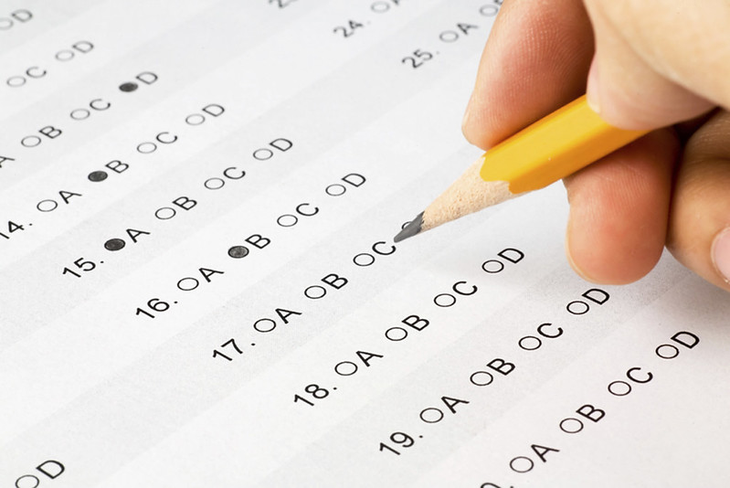 Student taking standardized test. Photo credit to Flickr website and Alberto G.