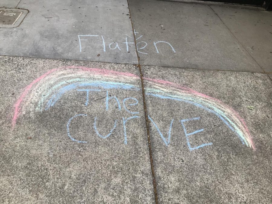 As coronavirus panic mounts, neighbors uplift each other with sidewalk chalk drawings.