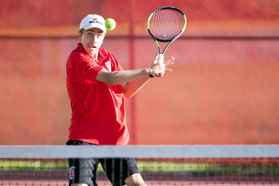 Playing against Tamalpais High School in the 2018 MCAL Tennis Championship, Luke Neal has his eyes on the ball. (Courtesy of Douglas Zimmerman/Special to Marin Independent Journal)