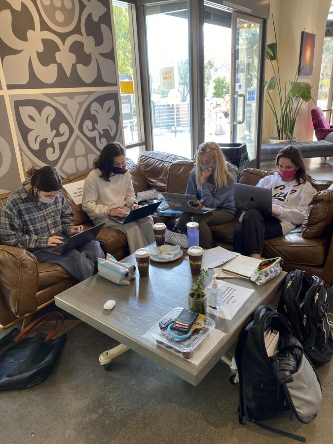 Four friends quietly study indoors at the local favorite, Philz Coffee, located in Town Center Corte Madera. 