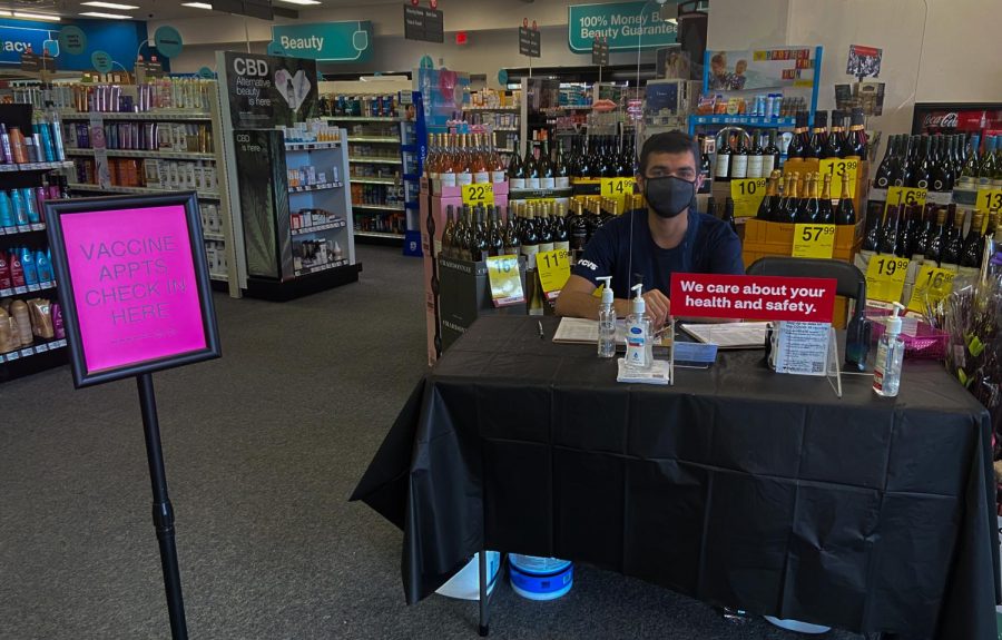 A CVS employee checks in Covid-19 vaccination appointments at the Belvedere Tiburon location. 