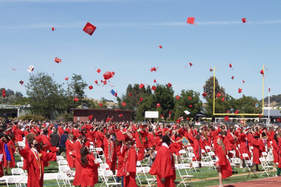 Tossing their caps into the air, the graduates celebrate the end of their high school journeys. Congratulations to the new Redwood Alumni!