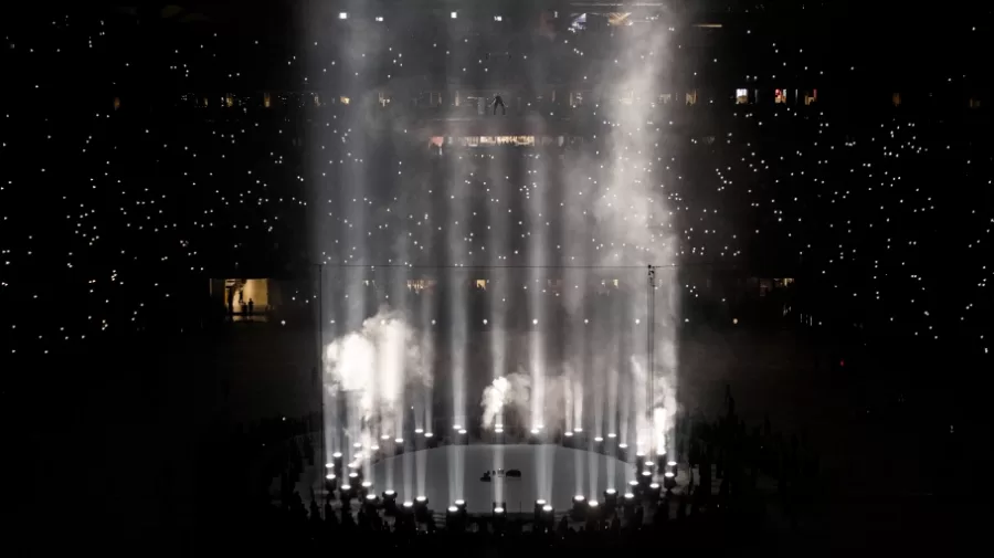 Surrounded by lights beaming towards the sky, Kanye floats up above the crowd at Mercedes-Benz Stadium during his first listening party on July 22nd. He does this while playing the last song on the album, “No Child Left Behind,” which features Vory and his Sunday Service Choir. 