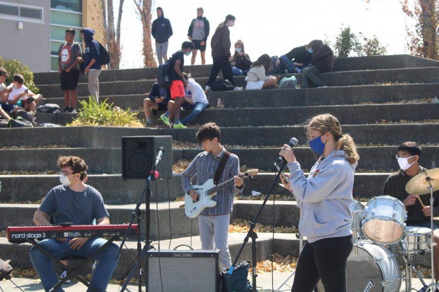 Four Redwood band members catch the eyes of hundreds attending club day.