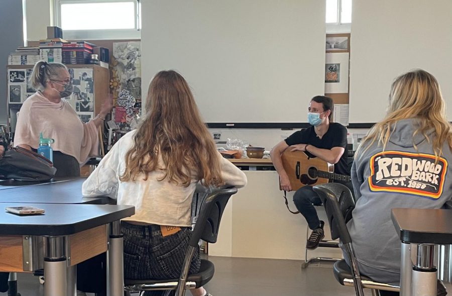 Playing his latest work, Marin native musician Dave Austin exhibits music for Redwood students. 