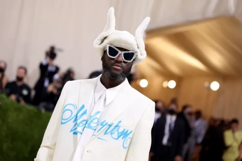 Wearing a suit with his signature incorporation of words, Abloh poses at the 2021 Met Gala. (Photo courtesy of John Shearer, Wire Image)
