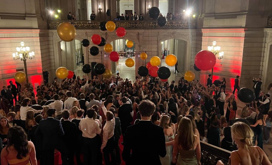 Dancing under festive balloons and lavish decor, Redwood students celebrate the schools first official prom in two years. 