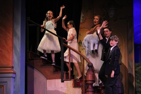 Heading up the stairs, the children of Captain von Trapp sing “So Long, Farewell.” 