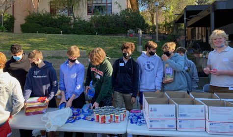 Packing boxes for a philanthropy event to help those who suffer from food insecurity, the NLYM Class of 2025 takes part in one of its many opportunities to make an impact. (Photo courtesy of Soo-Ah Landa)
