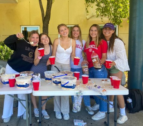 Wearing clothing to represent their next steps after graduation, seniors enjoy root beer floats.