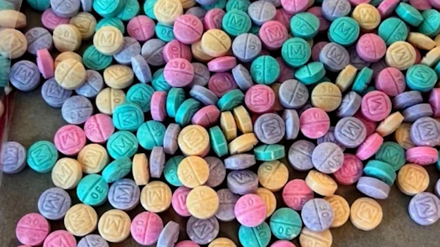 Hiding in the form of 30 mg oxycodone hydrochloride, rainbow fentanyl discreetly takes its place. (Photo courtesy of CBS News)