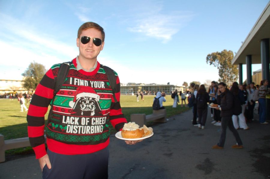 Carrying his bread bowl, junior Peter Dachtler took a more humorous approach to the ugly sweater theme.