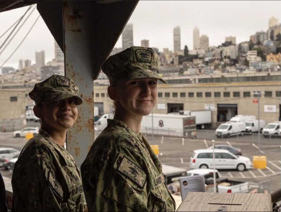 Smiling in her uniform, Izzy greets civilians who board the boat on fleet week. (Photo courtesy of Izzy Landry)
