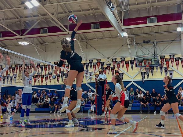Redwood spikes victory over Tam High in varsity volleyball showdown