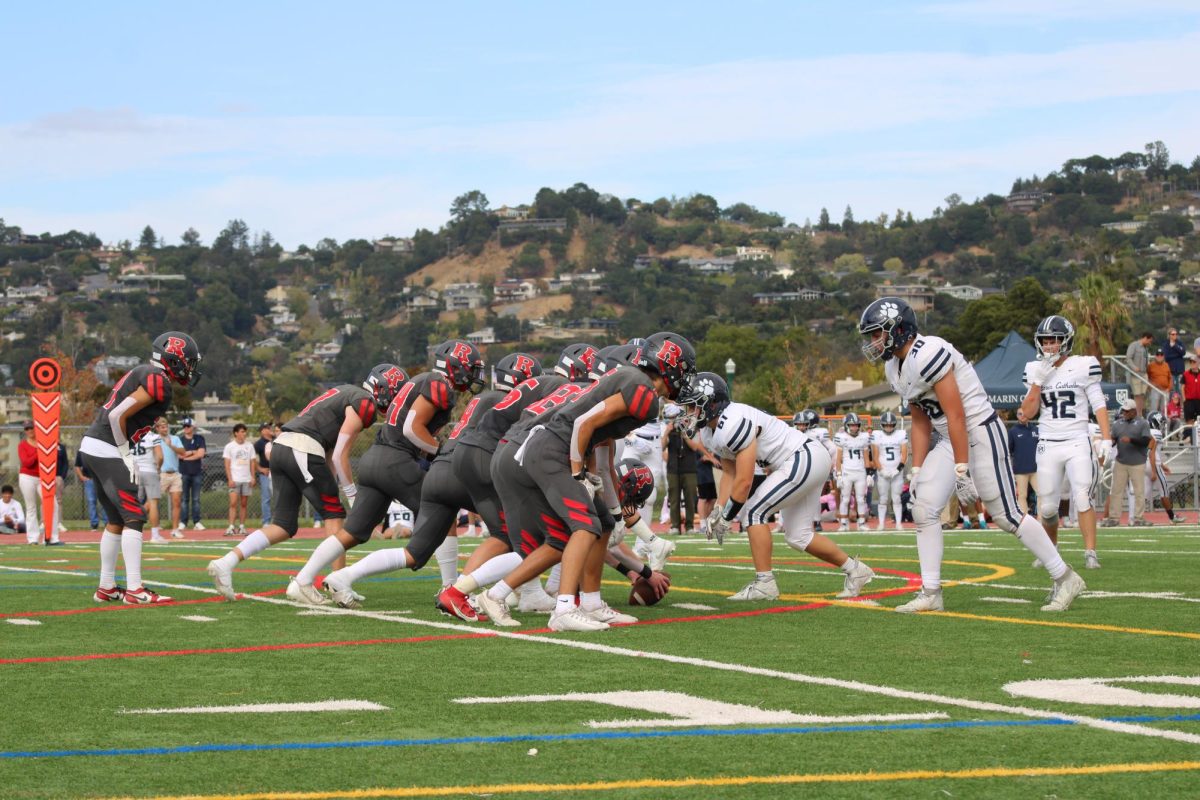 The defensive line stares down Marin Catholic’s offense, ready to get a stop or force a turnover.
