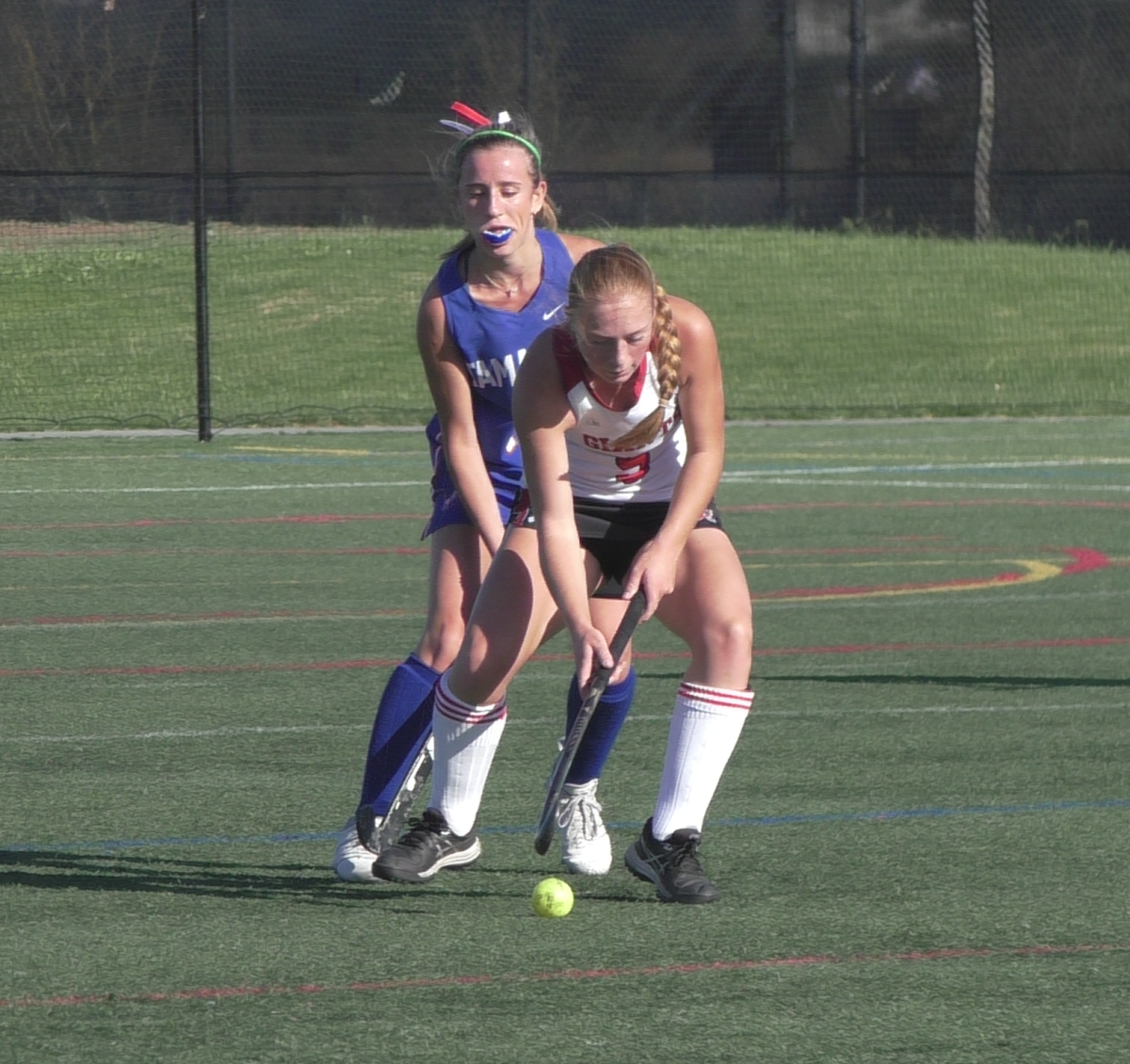 Senior Samantha Haan, moves up the field and seizes possession of the ball. 