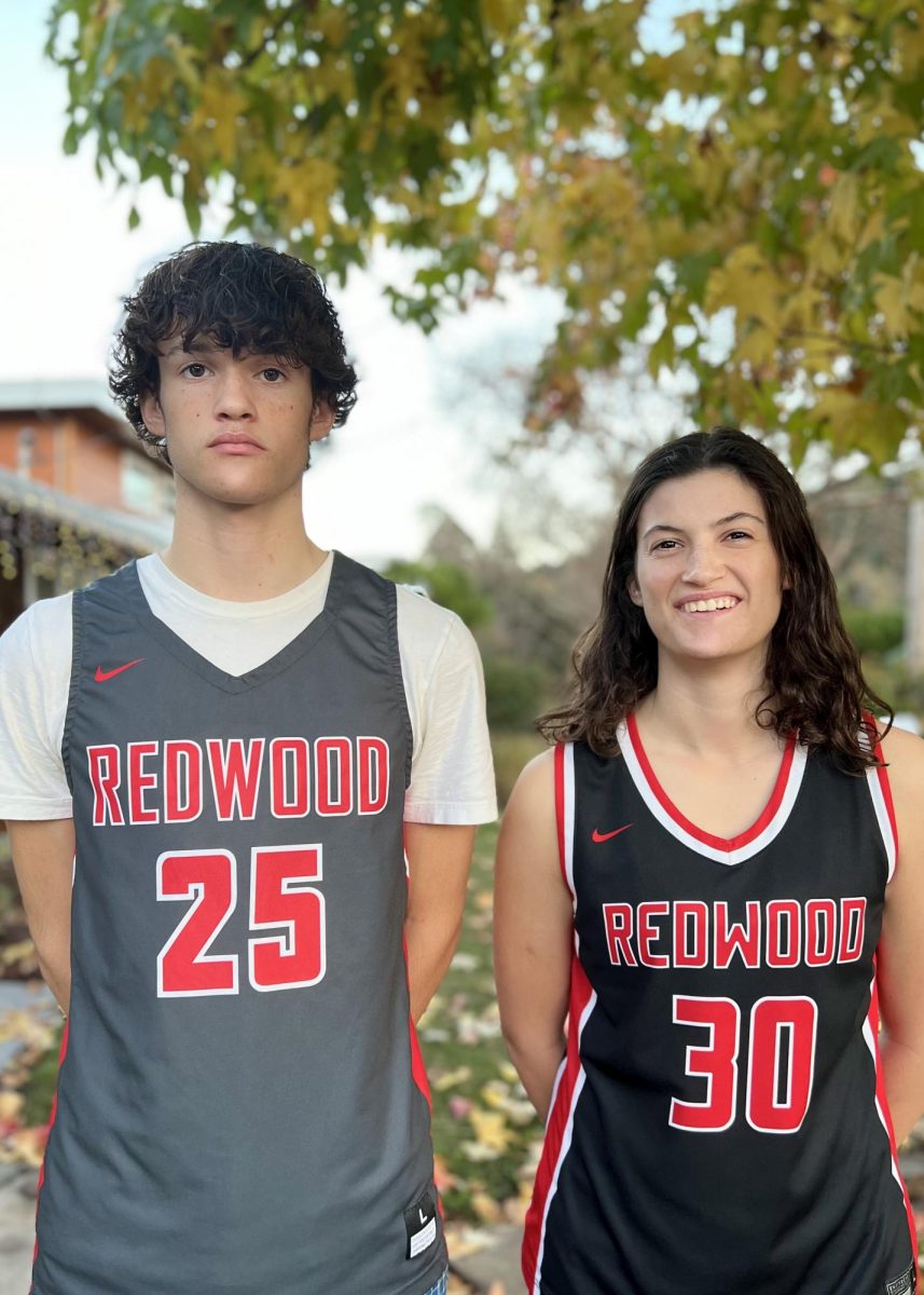 Kitty and Harrington White pose in their Redwood basketball jerseys. (Photo courtesy of Tessa White)